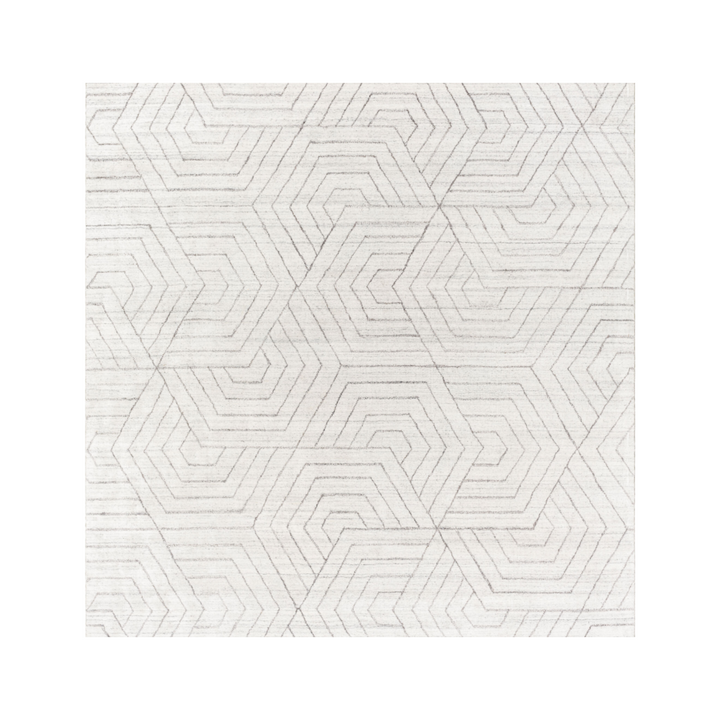 White rug with geometrical pattern on a white background