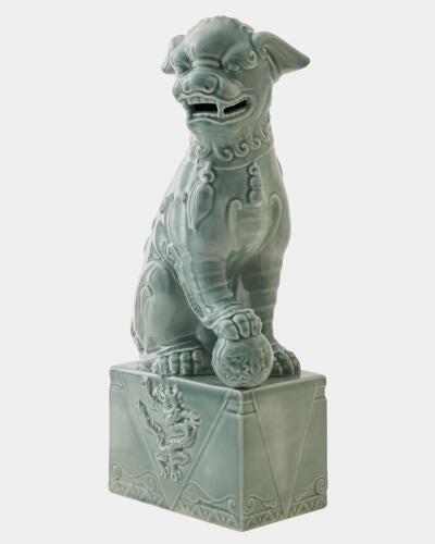 Three-quarter view of the blue Foo Dog sculpture