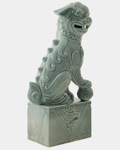 Profile view of the blue Foo Dog sculpture