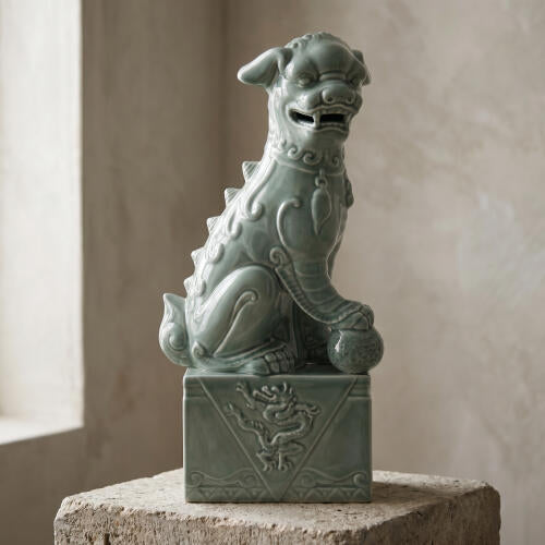 Blue Foo Dog sculpture styled in an interior vignette