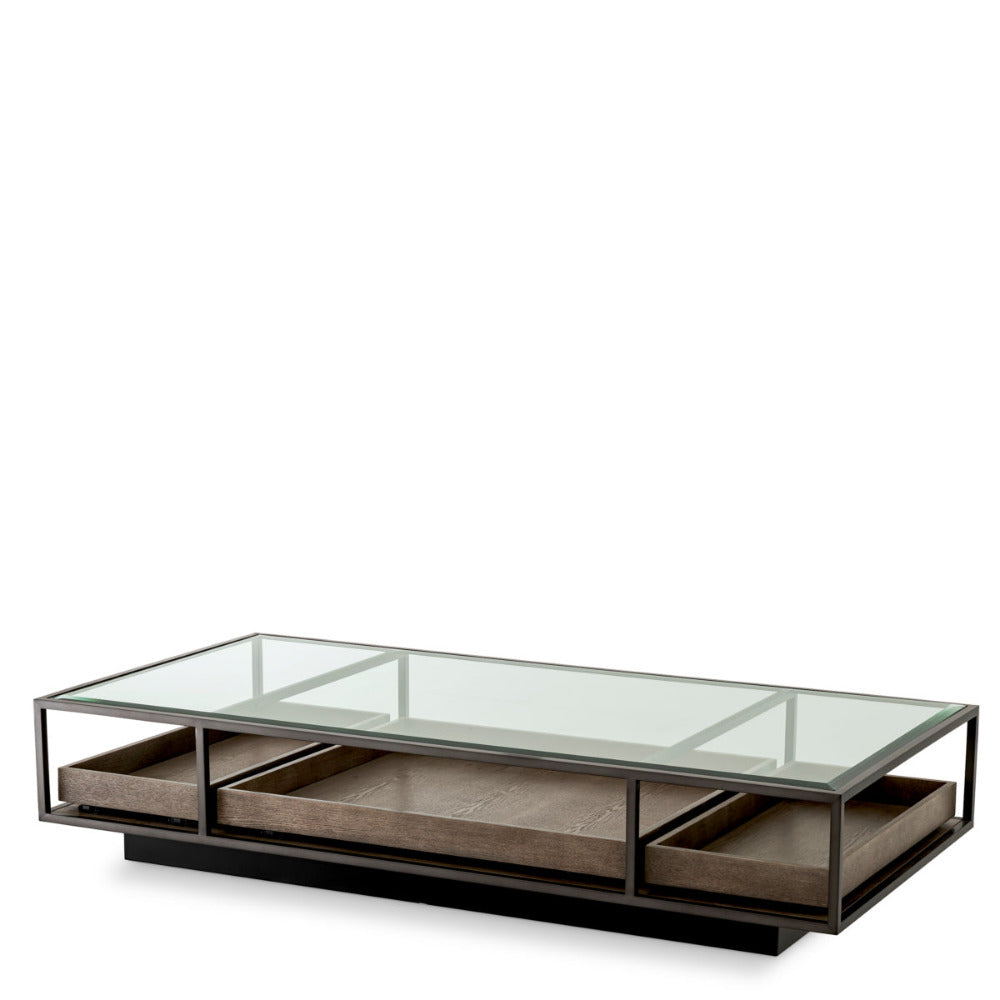 Modern coffee table with glass top and wooden drawers on a white background