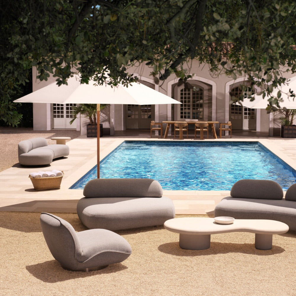 Outdoor pool with grey chairs