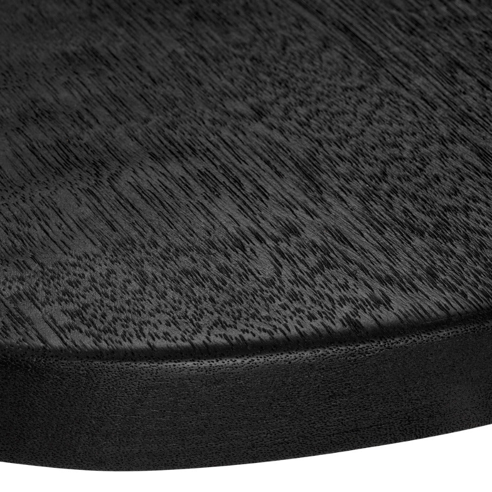 Close-up of a black textured  wooden surface
