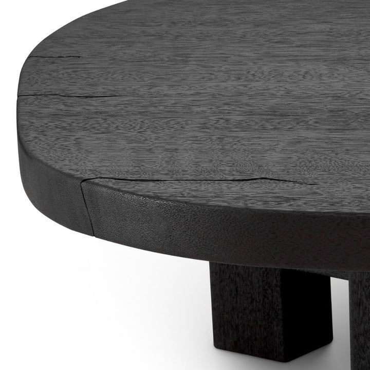 Round wooden table with a dark finish on a white background