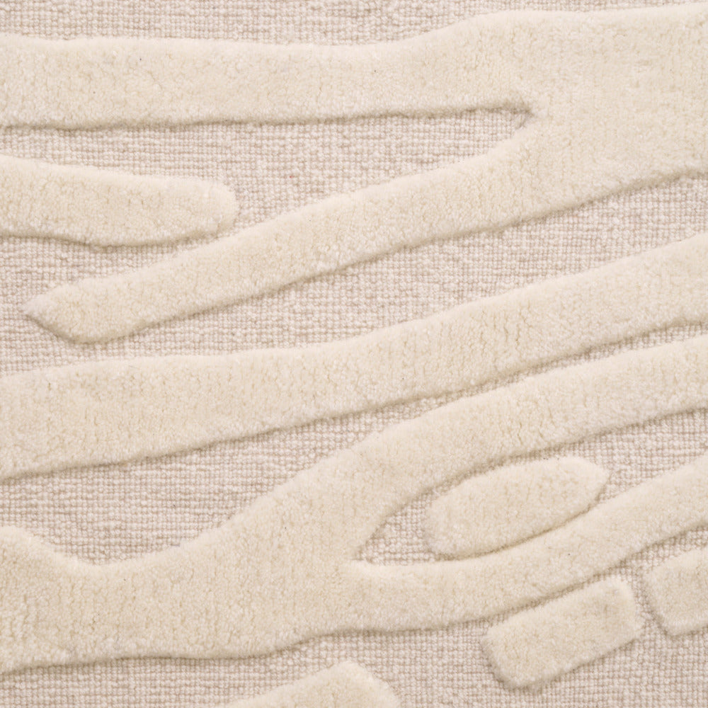 Close-up of beige fabric with a textured pattern