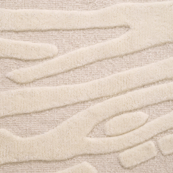 Close-up of beige fabric with a textured pattern