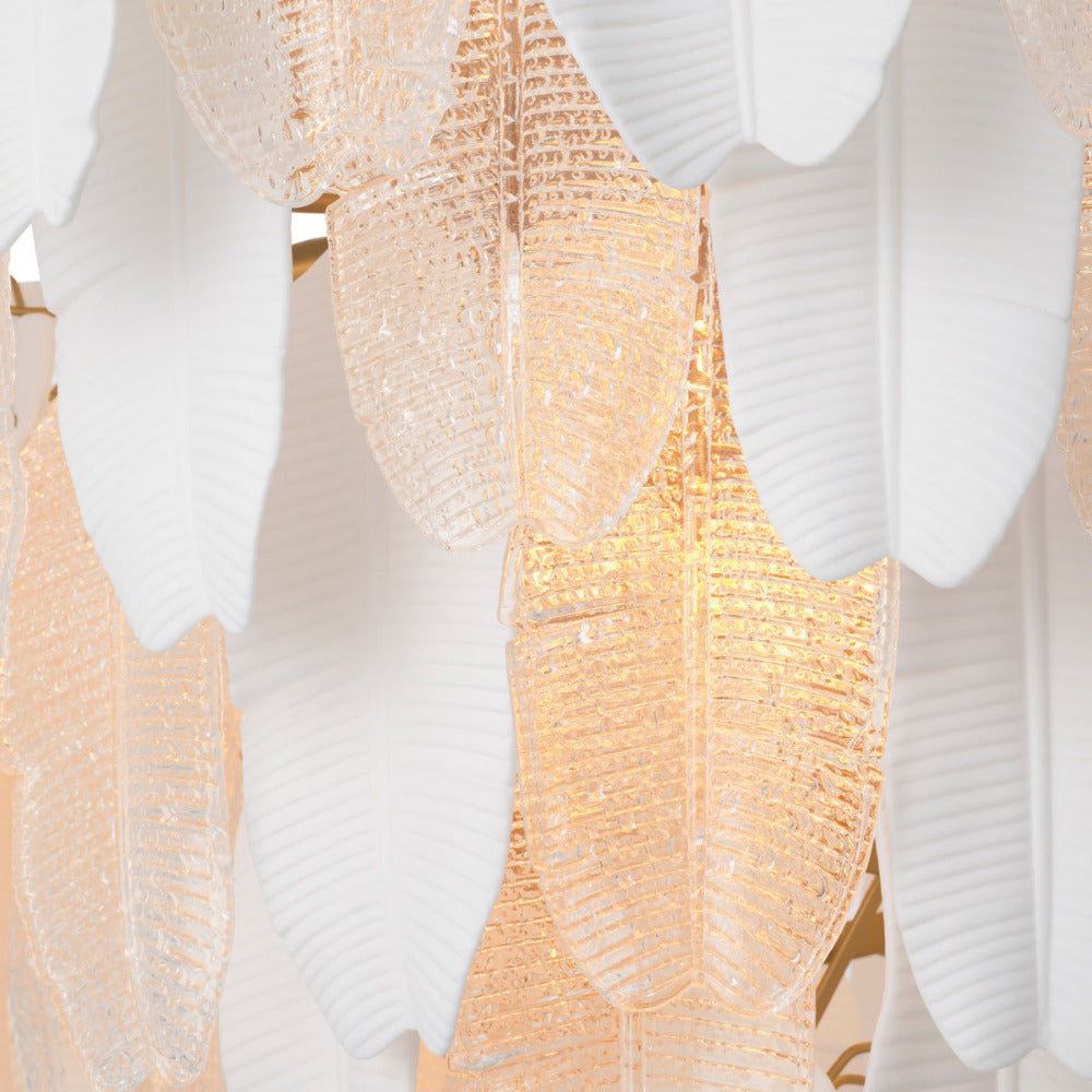Close-up of clear textured glass chandelier on a white background