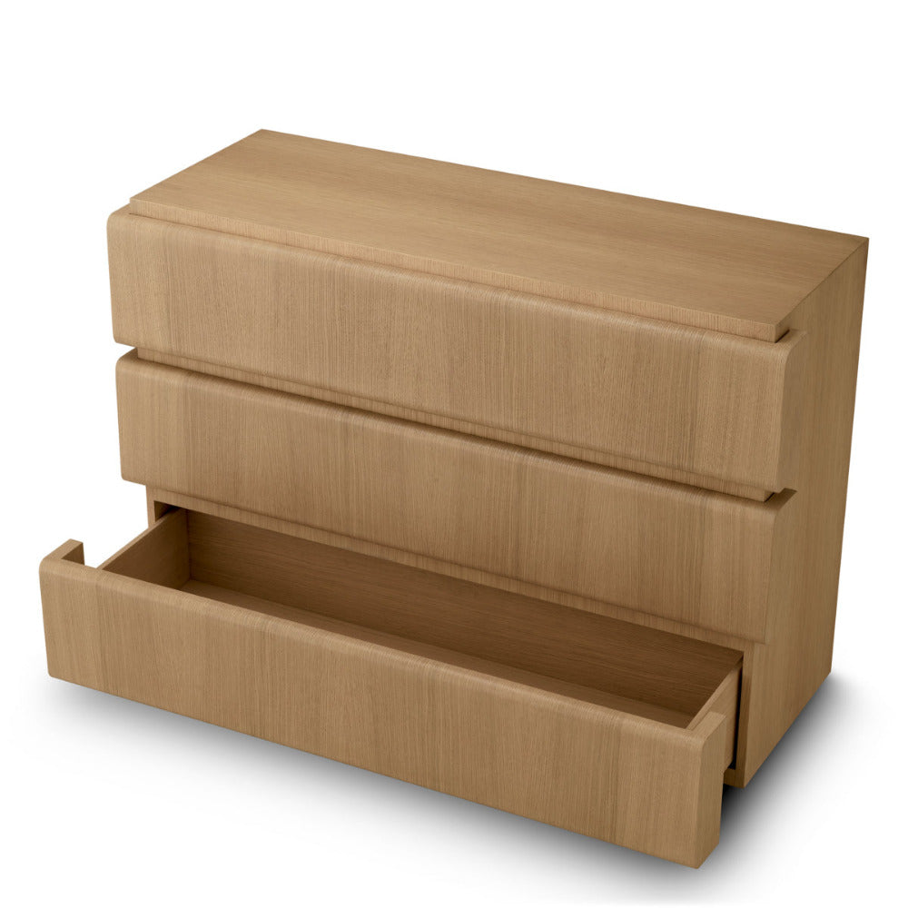 Wooden dresser with an open drawer on a white background