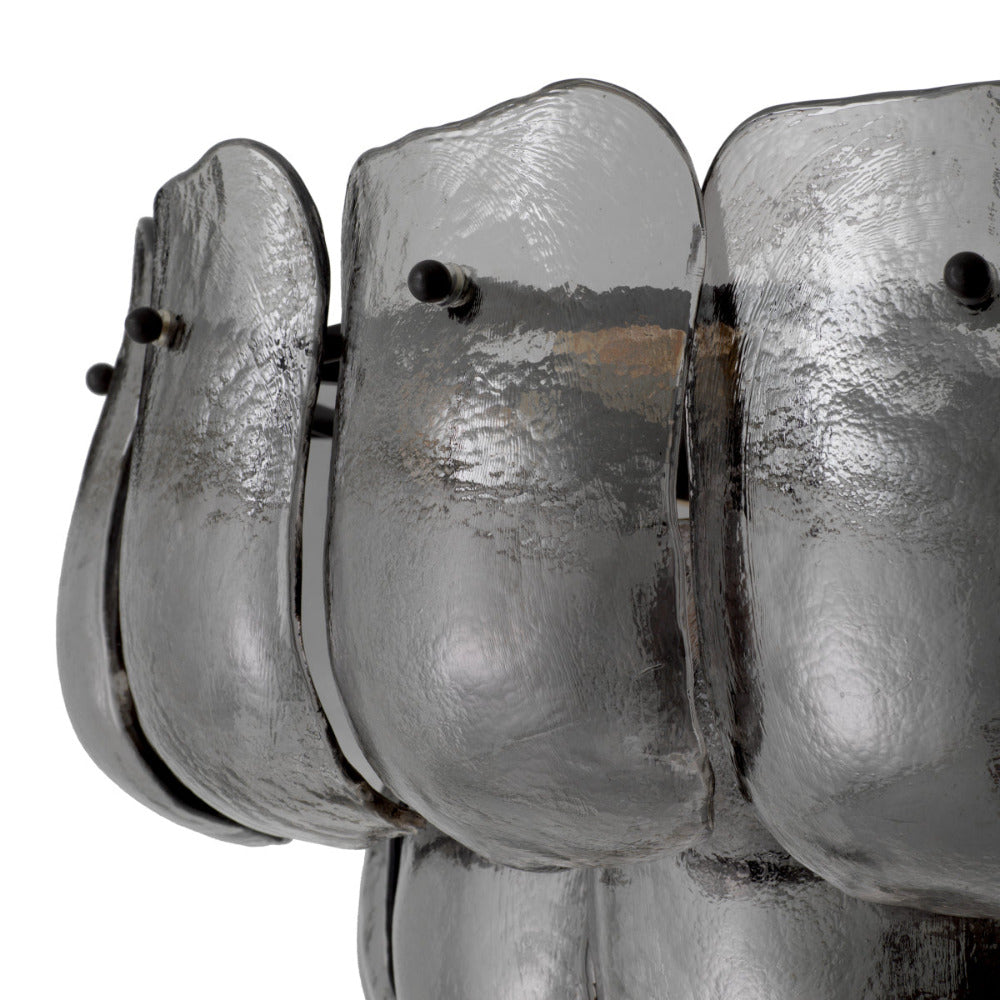 Close-up of grey glass chandelier on a white background