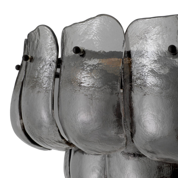 Close-up of grey glass chandelier on a white background