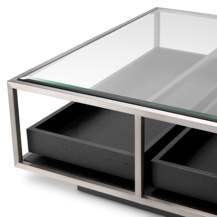 Modern coffee table with glass top and black storage drawers on a white background