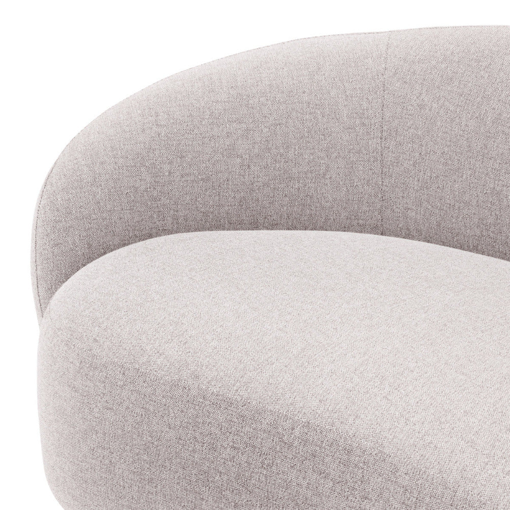 Close-up of a gray upholstered sofa with a textured fabric finish.