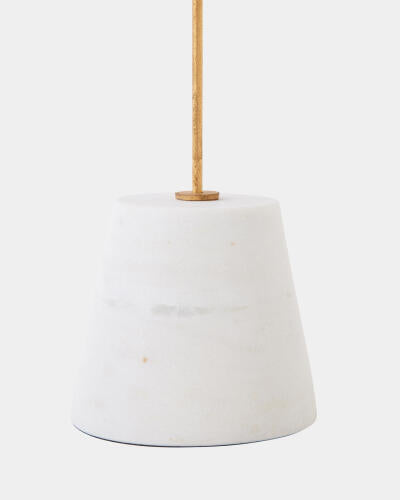 White marble base detail of the miter shell sculpture