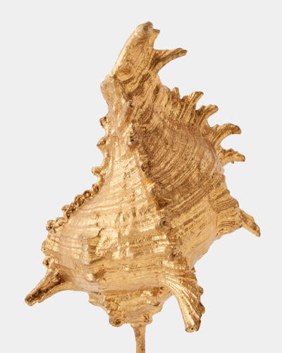 Close-up of gold leaf texture on the miter shell