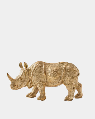 Profile view of the brass rhino sculpture