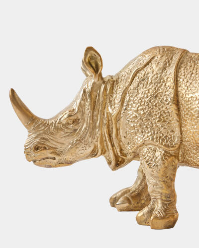 Close-up of the textured brass hide on the rhino sculpture