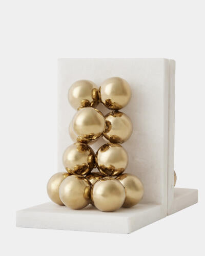 White marble base detail of the sphere bookends