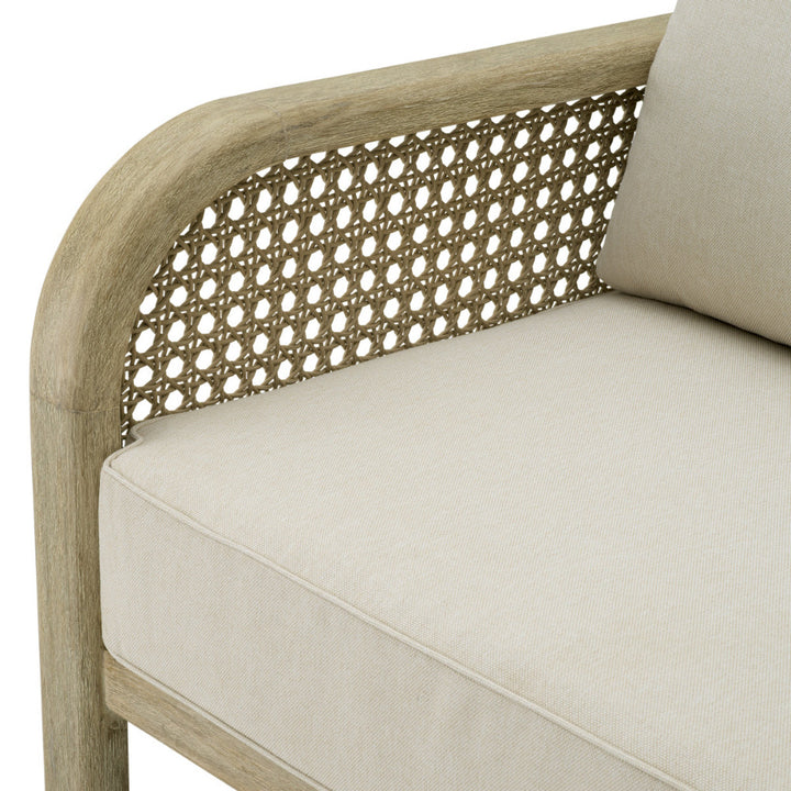Chair with woven backrest and beige cushion on a white background
