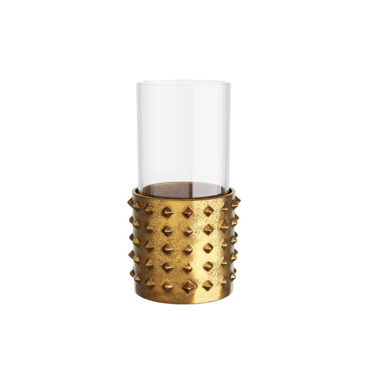 Golden candle holder with spike design on a white background