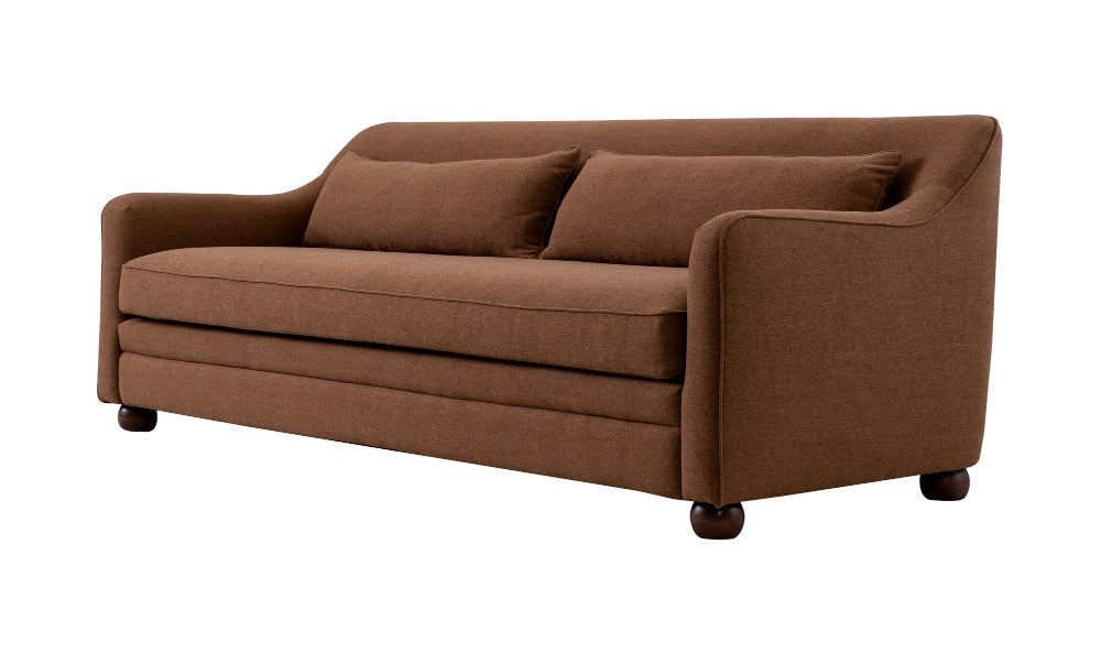 Brown sofa with cushions on a white background