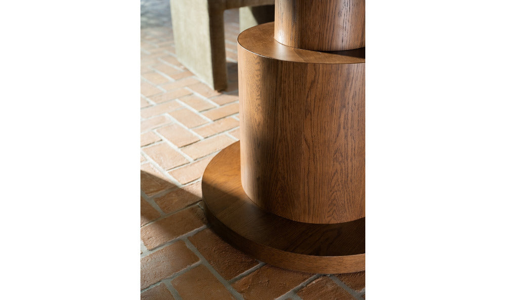 Wooden table base on a brick floor