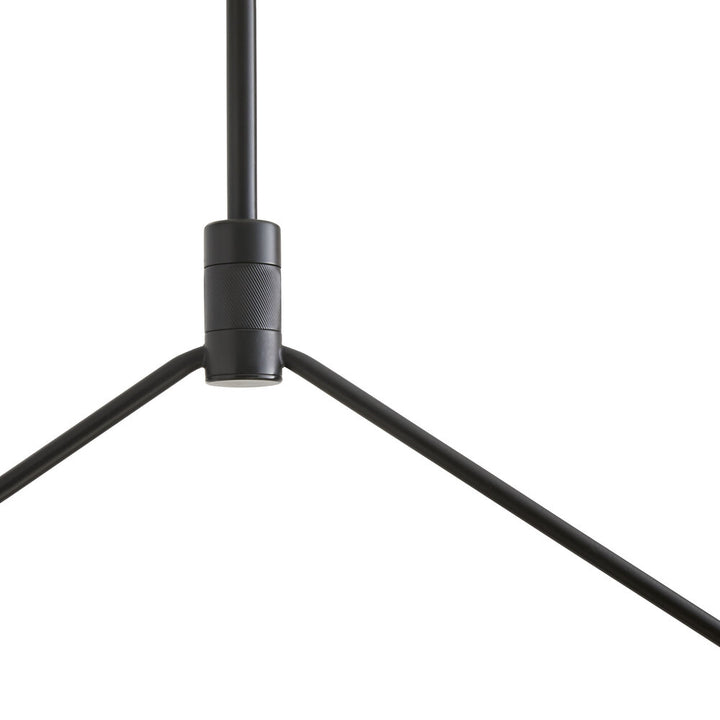 Modern black pendant light fixture on a white background