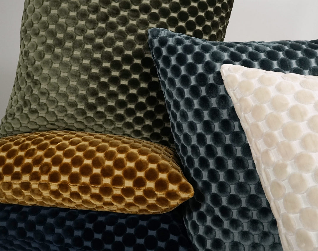 Dance Pacific pillows arranged on a sofa
