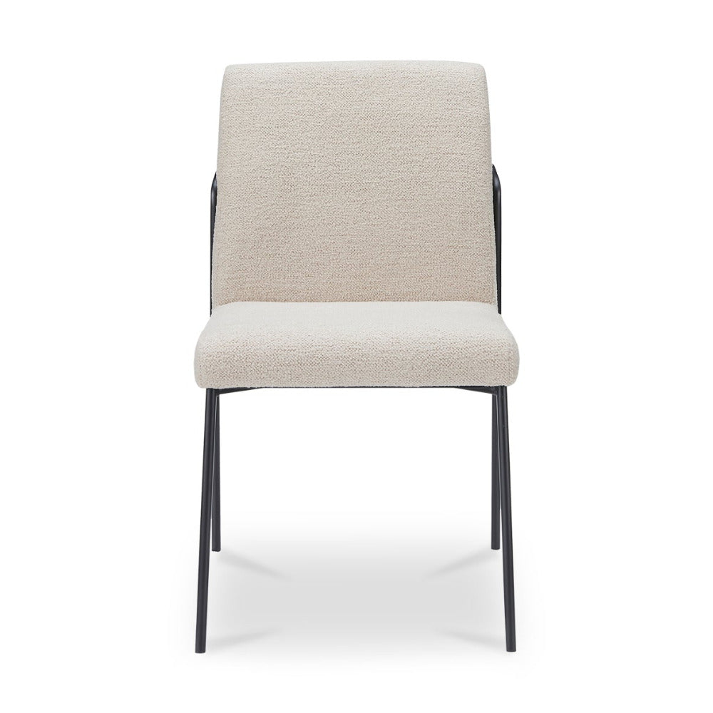 Ivory chair with black legs on a white background