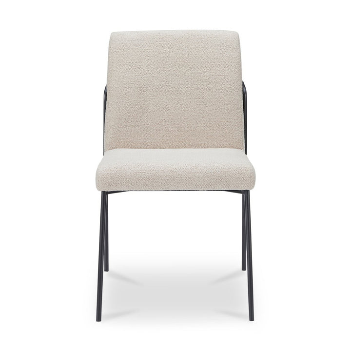 Ivory chair with black legs on a white background