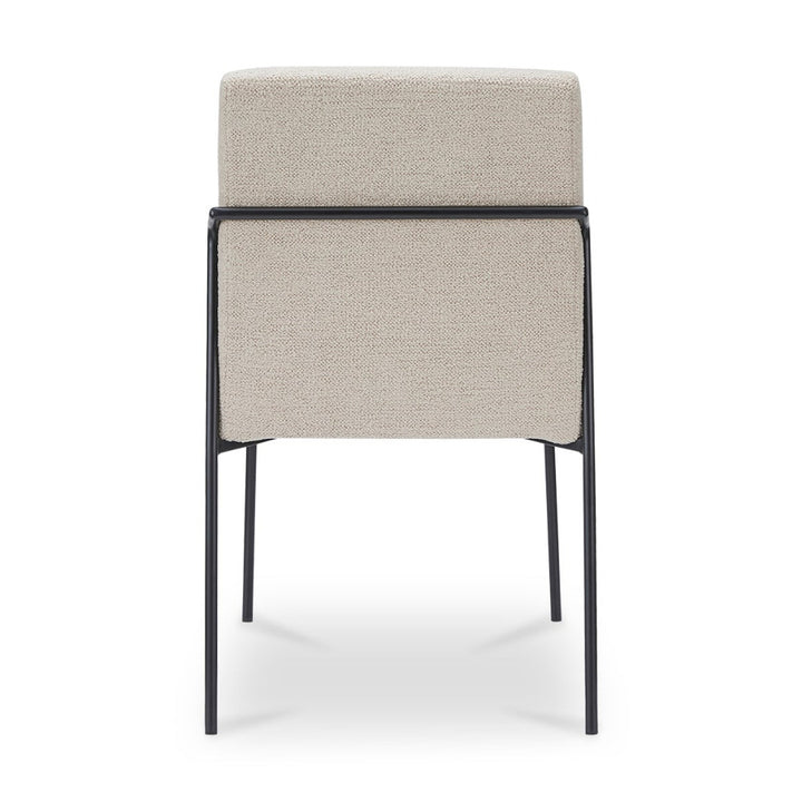 Chair with ivory cushioned seat and backrest on a white background