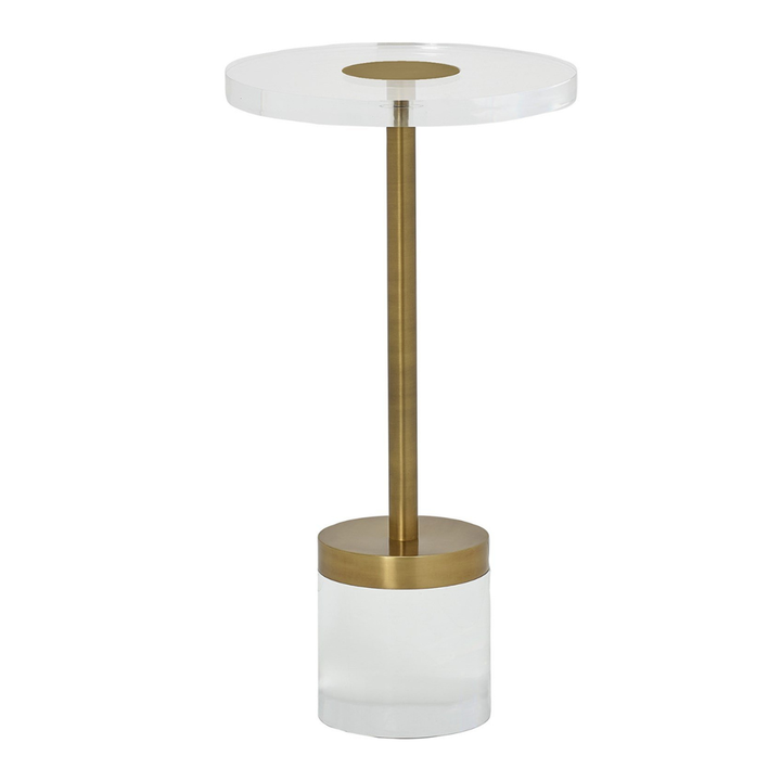 Decorative lamp with white shade and gold base on a white background