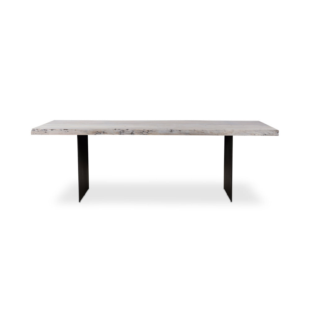 Table with wood top and black legs on a white background