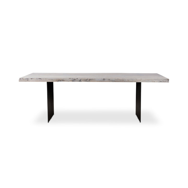 Table with wood top and black legs on a white background