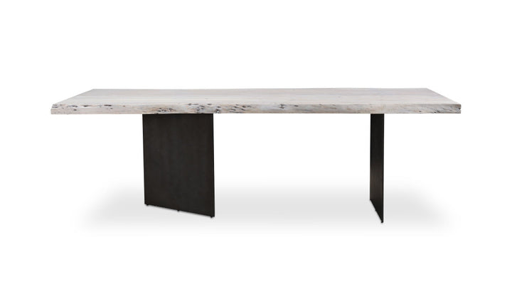 Dining table with wood top and black metal legs on a white background