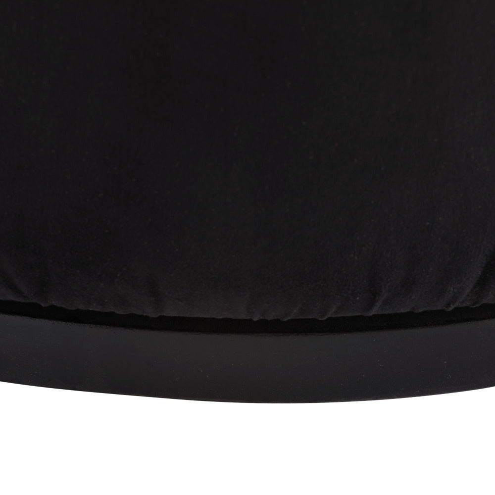 Close-up of a black seat cover on a white background