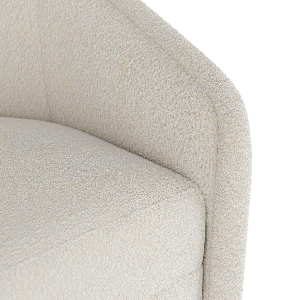 Close-up of a textured beige chair on a white background