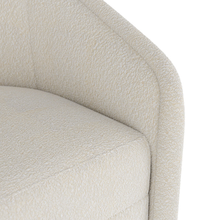 Close-up of a textured beige chair on a white background