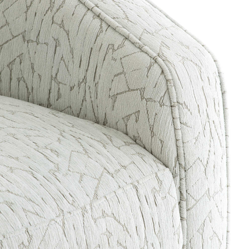 Close-up of a textured gray chair with a subtle pattern on a white background
