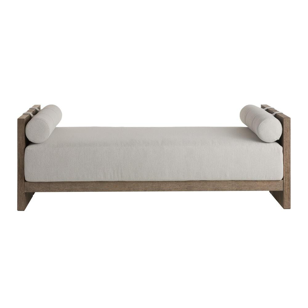 Sleek daybed with white cushion and wooden frame on a white background