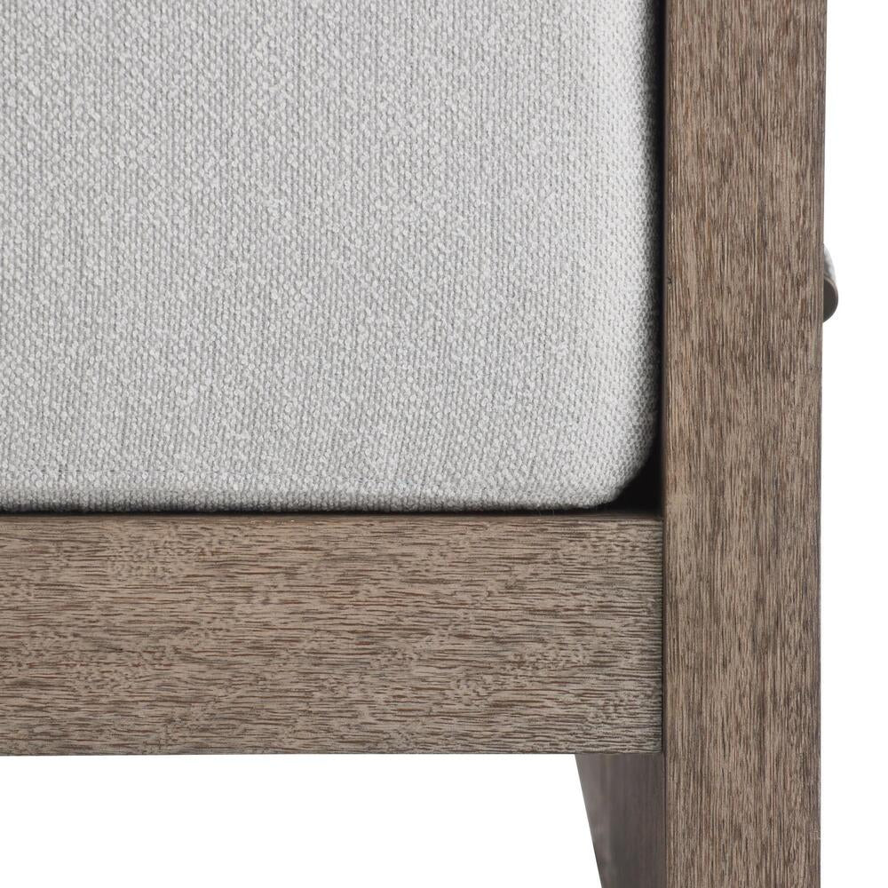 Close-up of a wooden frame with a gray cushion on a white background