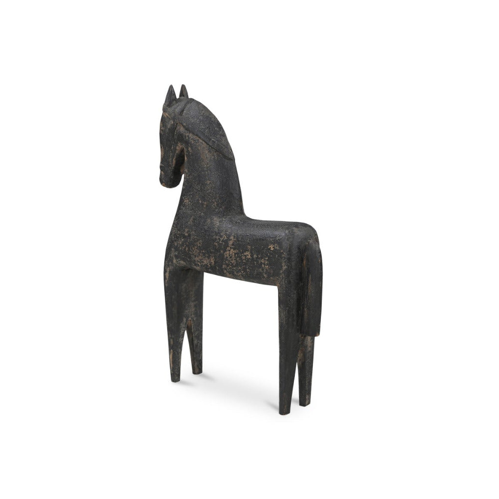 Black wooden horse sculpture on a white background