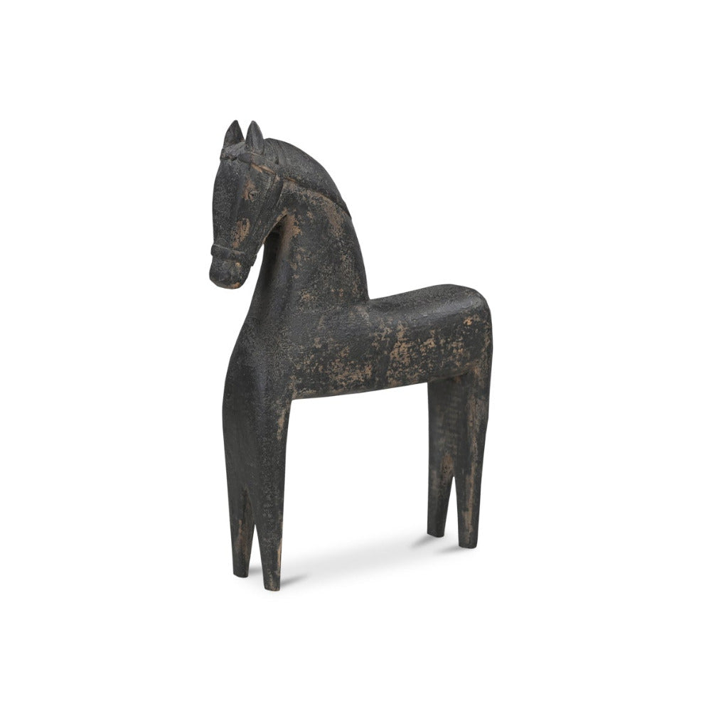 Black wooden horse sculpture on a white background