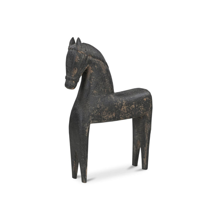 Black wooden horse sculpture on a white background