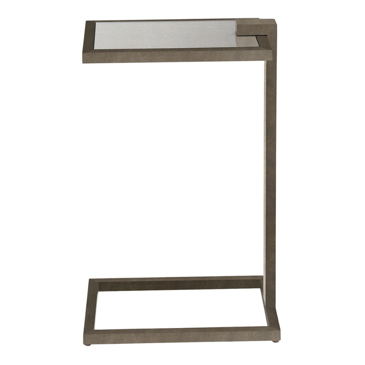 Modern side table with glass top on a white background