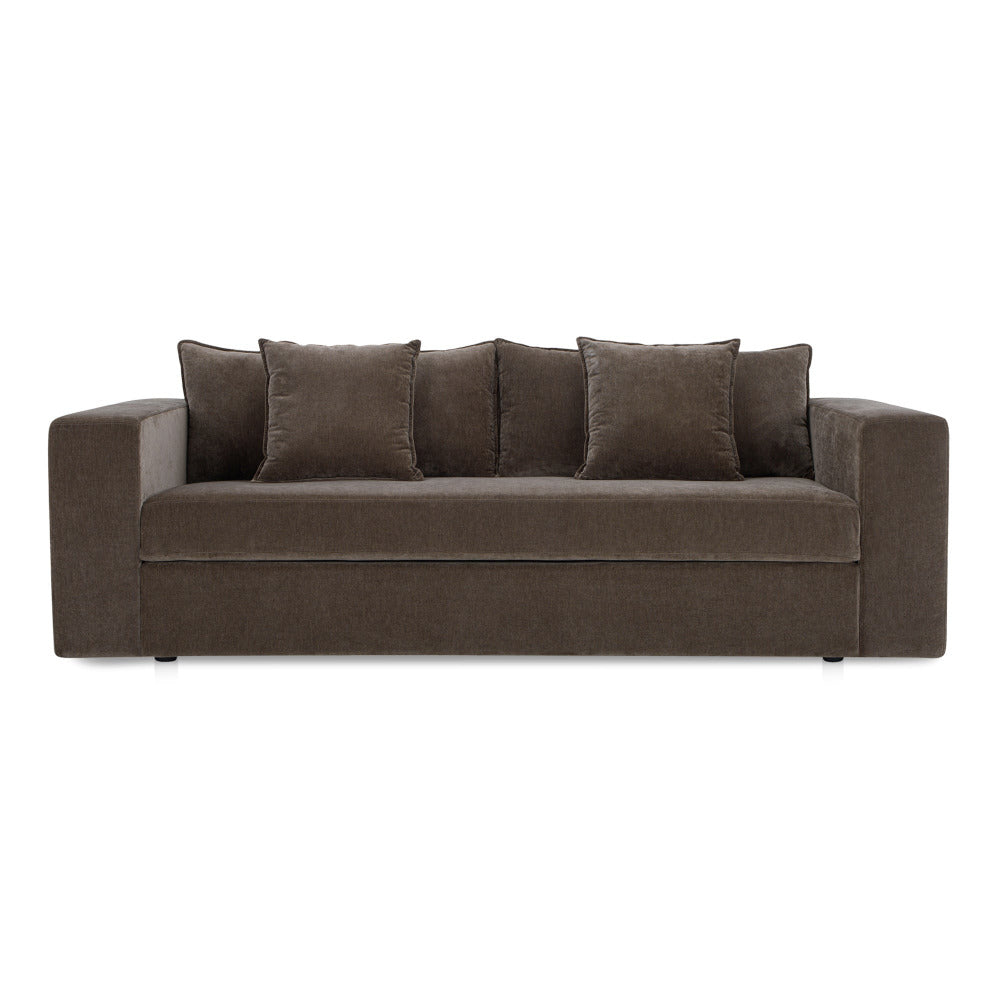 Brown sofa with cushions on a white background