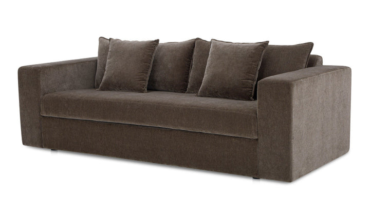 Brown sofa with four cushions on a white background