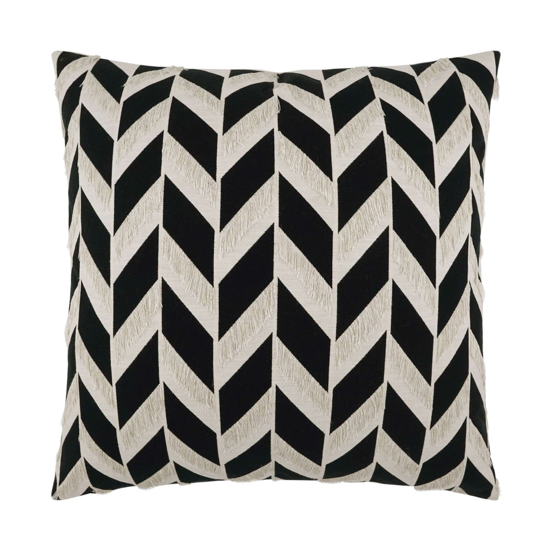 A square-shaped throw pillow with a black and beige geometric pattern, featuring a zipper closure.
