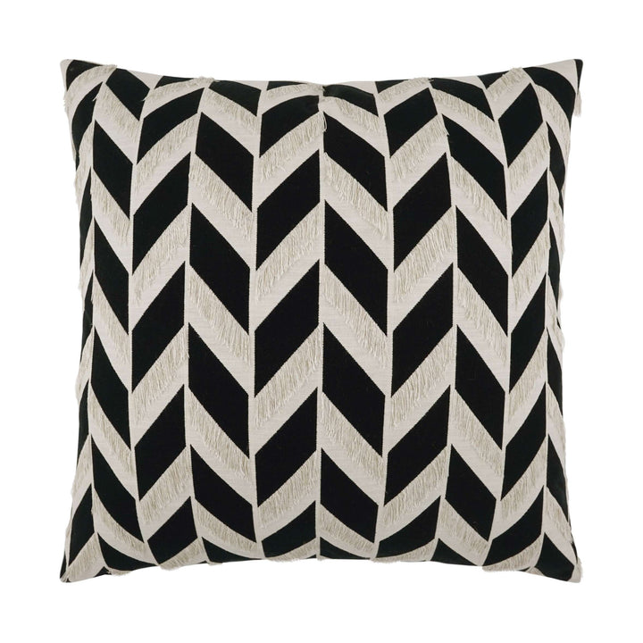 A square-shaped throw pillow with a black and beige geometric pattern, featuring a zipper closure.