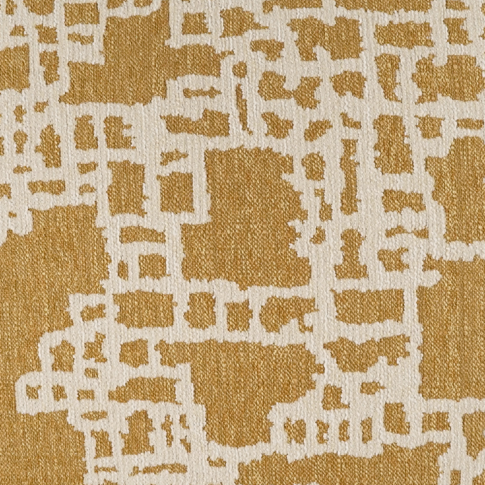 Close-up of a textured gold and beige fabric pattern