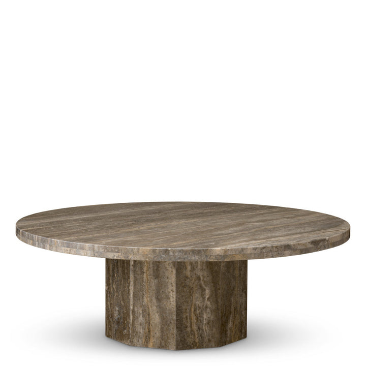 Round stone table with a textured surface on a white background